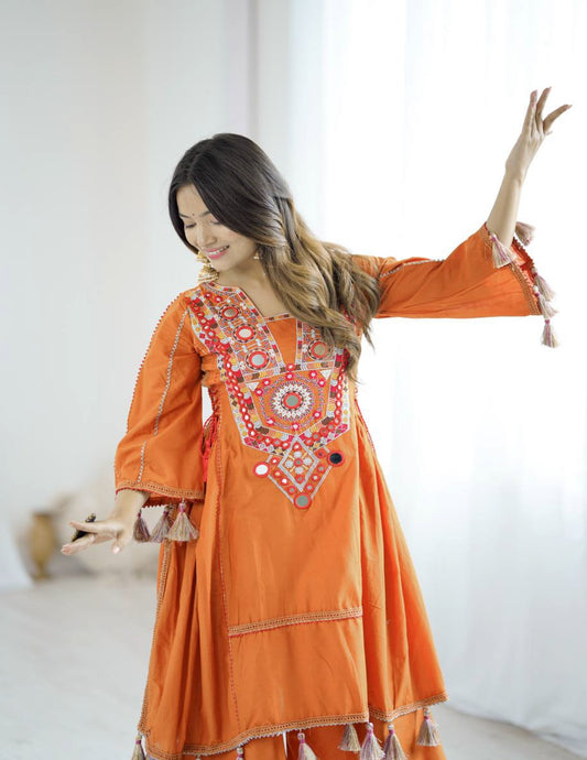 Orange Peplum Style Suit With Foil Mirror Work and tassels